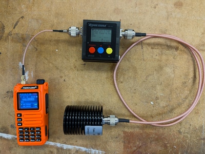 Measuring transmit power using an orange TIDRADIO H9, a Surecom SW-102, and a dummy load